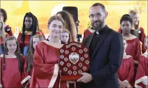  ??  ?? Aisling King with the Fr Martin Kenny award.