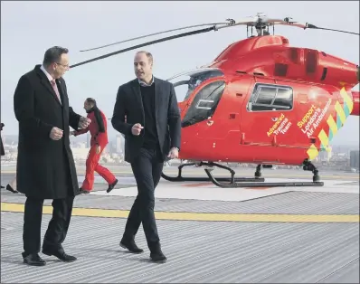  ?? PICTURE: IAN VOGLER/DAILY MIRROR/PA ?? AIR LIFT: The Duke of Cambridge arrives at the Royal London Hospital for London’s Air Ambulance 30th anniversar­y.