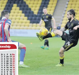  ??  ?? Eyes on the ball Keaghan Jacobs takes on Liam Polworth