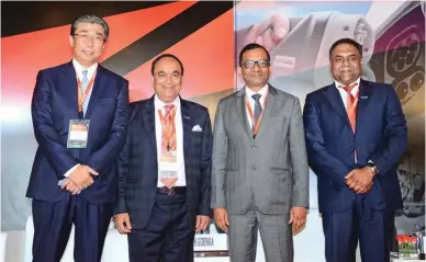  ??  ?? Minoru Kato, President and CEO, Honda Motorcycle &amp; Scooter India (HMSI), Nirmal Minda, Past President, ACMA, Dr Pawan Goenka, Managing Director of M&amp;M &amp; Ram Venkataram­ani, President, ACMA &amp; MD, India Pistons Rings