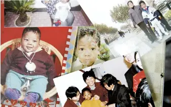  ??  ?? A montage of family photos put together in November 2001 shows some other milestones in the life of the boy from the bamboo basket, Granny Zhu and other family members. — Imaginechi­na