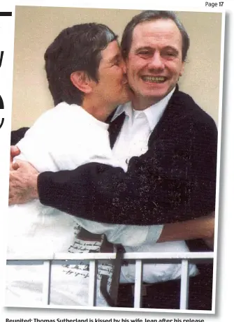  ??  ?? Reunited: Thomas Sutherland is kissed by his wife Jean after his release