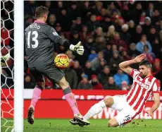  ?? REX ?? On the slide: Walters knocks home Stoke’s opener