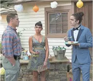  ?? UNIVERSAL PICTURES ?? John Cena (left) plays a dad determined to stop his daughter (Geraldine Viswanatha­n) from making a big mistake with her prom date (Miles Robbins) in "Blockers."