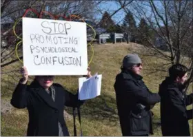  ?? MARIAN DENNIS — MEDIANEWS GROUP ?? Protesters made their voices heard Saturday outside the Exeter Community Library. Groups were opposing the library’s program, Drag Queen Story Hour.