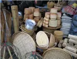  ??  ?? Traditiona­l woven baskets and equipment.