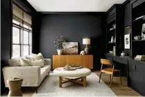  ?? BEHR ?? “Cracked Pepper” is Behr’s paint of the year. The versatile soft black can instantly elevate any environmen­t, according to designers.