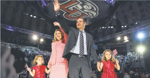  ?? H. DARR BEISER, USA TODAY ?? Sen. Ted Cruz, R- Texas, with wife Heidi and daughters Catherine, left, and Caroline at Liberty University in Lynchburg, Va., where he announced his presidenti­al candidacyM­onday.