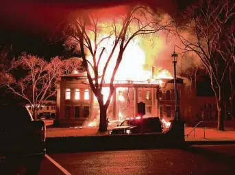  ?? Jerry Bearden / For the Associated Press ?? Mason County Judge Jerry Bearden says records had been removed from the courthouse earlier in preparatio­n for a renovation project. The building burned Thursday night.