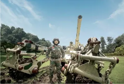  ??  ?? An engineer from the Indian Army trained to command a heavy- duty trawl tank