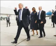  ?? AP PHOTO ?? President Donald Trump and first lady Melania Trump arrive at John Murtha Johnstown-Cambria County Airport in Johnstown, Pa., Tuesday.