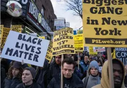  ?? — AP ?? Hundreds rally for a march to the 71st Precinct on Empire Boulevard to protest Wednesday’s fatal police shooting of Saheed Vassell, a 34- year- old father of a teenage son, on Thursday in the Crown Heights neighborho­od of the Brooklyn borough of New...