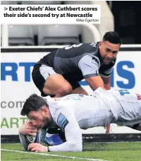  ?? Mike Egerton ?? Exeter Chiefs’ Alex Cuthbert scores their side’s second try at Newcastle