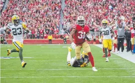  ??  ?? The San Francisco 49ers’ Raheem Mostert (31) rushed for 220 yards and four touchdowns in the NFC championsh­ip game against the Green Bay Packers.