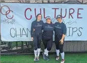  ?? Luca Evans Los Angeles Times ?? JUSTINE LAMBERT, left, Anahi Arreola, middle, and Paityn Lavin with a banner for their late coach.