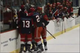  ?? BY JOE BOYLE JBOYLE@DIGITALFIR­STMEDIA.COM @BOYLERALER­TTROY ON TWITTER ?? RPI Hockey celebrates after Meirs Moore’s game tying goal in the second period against Union on October 26