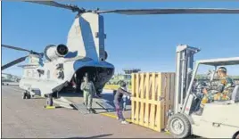  ??  ?? IAF airlifting machinery, including bio-safety cabinets, centrifuge­s and stabiliser­s, from Jammu for setting up additional testing facilities in the Union Territory of Ladakh.