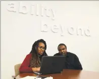  ??  ?? Employment Specialist Chenelle James helps client Earl Melton at The Bethelbase­d disabiliti­es services giant, Ability Beyond facility in Norwalk. October is national disabiliti­es awareness month.