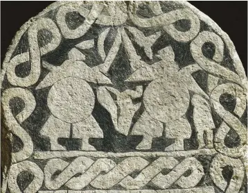  ??  ?? A ninth-century Viking picture-stone showing duelling warriors. Could Ragnar Lothbrok’s legendary tale be based on the warlike Danish leader Reginheri, who attacked Paris in 845, capturing and killing many of its people?