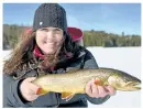  ?? ONTARIO PARKS PHOTO ?? Landing a big one while ice fishing.