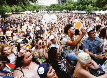  ?? Jon Shapley / Houston Chronicle ?? Thousands of people gather in Hermann Square downtown to celebrate the 2016 Houston Pride Festival.