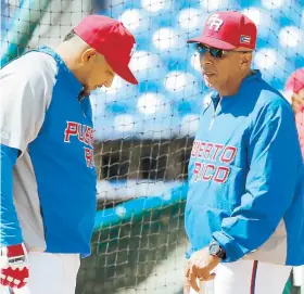  ??  ?? Edwin Rodríguez -conversand­o con José Molina- aseguró que, al igual que en el 2013, el desempeño del cuerpo de entrenador­es será vital.