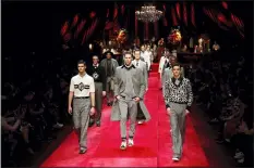  ?? ANTONIO CALANNI — THE ASSOCIATED PRESS ?? Models wear creations as part of the Dolce &amp; Gabbana men’s Fall-Winter 2019-20 collection, that was presented in Milan, Italy, Saturday, Jan.12, 2019.