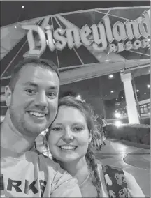  ?? AP PHOTO ?? This photo provided by Clark Ensminger shows him with his wife, Heather Ensminger, at Disneyland earlier this week in Anaheim, Calif.