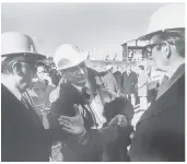  ?? JEAN-PIERRE RIVEST, GAZETTE FILES ?? Olympic Stadium architect Roger Taillibert is flanked by Mayor Jean Drapeau, left, and Governor General Jules Léger as he explains his design at the constructi­on site in 1975.