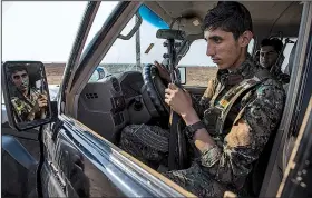  ?? AP/BADERKHAN AHMAD ?? Kurdish forces withdraw Sunday from an area outside Amuda, Syria, near the Turkish border.