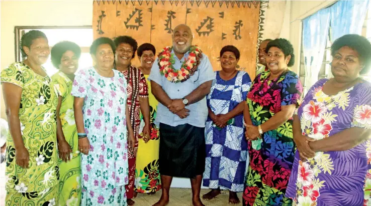  ?? Photo: Ministry of Fisheries ?? Minister for Fisheries Semi Koroilaves­au (sixth from left) with villagers of Teci in Yasawa during the handover of the solar freezer at the Teci Village hall on September 19, 2020.