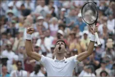  ?? TIM IRELAND — THE ASSOCIATED PRESS ?? Serbia’s Novak Djokovic celebrates defeating Belgium’s David Goffin during a men’s quarterfin­al match on day nine of the Wimbledon Tennis Championsh­ips in London Wednesday.