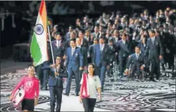  ?? AFP ?? India’s flagbearer PV Sindhu leads the delegation during the opening ceremony of the 2018 Commonweal­th Games at Carrara Stadium in Australia’s Gold Coast on Wednesday. &gt;&gt; P21