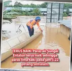  ??  ?? TERUS NAIK: Paras air Sungai Entalun terus naik sehingga paras lima kaki pada jam 5.22 petang semalam.