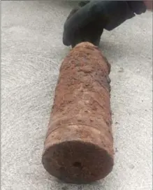  ?? ADRIENNE COLETTO, SUPPLIED PHOTO ?? This artillery shell was found by a couple on Hixon Road in the east end of Hamilton Monday night.