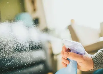  ?? CATHERINE FALLS COMMERCIAL/GETTY ?? Believe it or not, you’ll actually use less cleaner if you spray it directly on your surface than on a cloth.