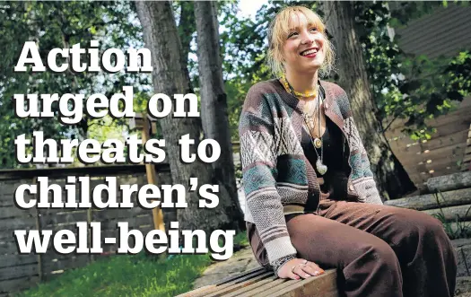  ?? TIM KROCHAK • THE CHRONICLE HERALD ?? Grade 11 student and activist Rae Stevens sits in the backyard of her family's home in Halifax on Wednesday.