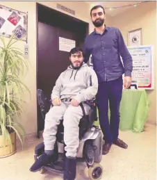  ?? DAN JANISSE ?? Mohamad Nadi, left, and Ahmad Bazzi are raising money to fund a new elevator at the Islamic community centre on Janette Avenue.