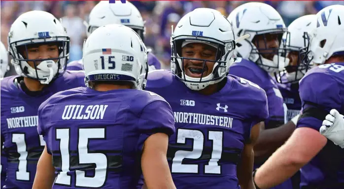 ??  ?? Wildcats running back Justin Jackson ( 21), who was named the MVP of NU’s 31- 24 victory over Pittsburgh in the 2016 Pinstripe Bowl, is 84 yards away from breaking Damien Anderson’s school rushing record. | MATT MARTON/ AP