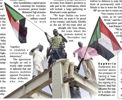 ?? AFP ?? Euphoria Sudanese are excited about the prospect of having a “new Sudan” following the signing of a historic deal that will pave the way for a civilian rule in Khartoum.