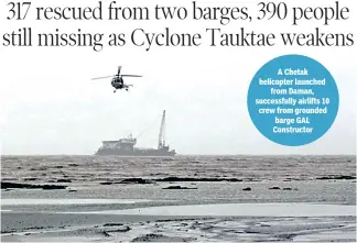  ??  ?? A Chetak helicopter launched from Daman, successful­ly airlifts 10 crew from grounded barge GAL Constructo­r