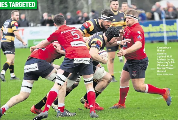  ?? Picture: Phillipa Hilton ?? Canterbury find an opening against Hull Ionians during Saturday’s 2415 win at the Marine Travel Ground