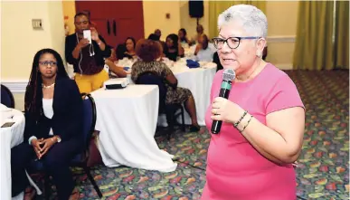  ?? FILE ?? Chief technical director in the Office of the Prime Minister, Jacqueline Lynch-Stewart, makes a presentati­on on the National Identifica­tion System to the Jamaica Chamber of Commerce at a JCC Breakfast Conversati­on forum held at Knutsford Court Hotel, New Kingston, on Thursday, December 13, 2018.