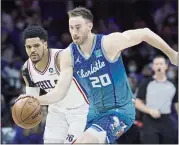  ?? TIM NWACHUKWU — GETTY IMAGES ?? Gordon Hayward of the Charlotte Hornets dribbles down the court after making a steal during Wednesday’s win.