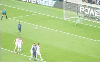  ??  ?? Antoine Griezmann send the goal keeper the wrong way from the penalty spot.