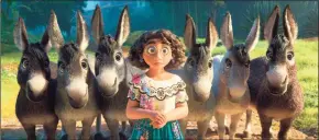  ?? Disney / Associated Press ?? This image released by Disney shows Mirabel, voiced by Stephanie Beatriz, in a scene from the animated film “Encanto.”