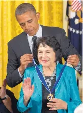  ?? CAROLYN KASTER/AP ?? President Barack Obama awards American labor leader and civil rights activist Dolores Clara Fernandez Huerta the Presidenti­al Medal of Freedom, during a ceremony in the East Room of the White House in Washington. Huerta, the social activist who formed...