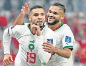  ?? AFP ?? Morocco's Youssef En-nesyri celebrates with Sofiane Boufal after scoring against Canada at the Al-thumama Stadium.