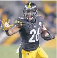  ?? CHARLES LECLAIRE, USA TODAY SPORTS ?? Tailback Le’Veon Bell had 182 yards from scrimmage in the Steelers’ 24- 14 victory.