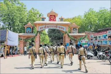  ?? AP ?? Police personnel outside Asaram's ashram in Ahmedabad on Wednesday.